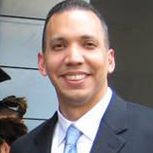 Commissioner Louis Molina
